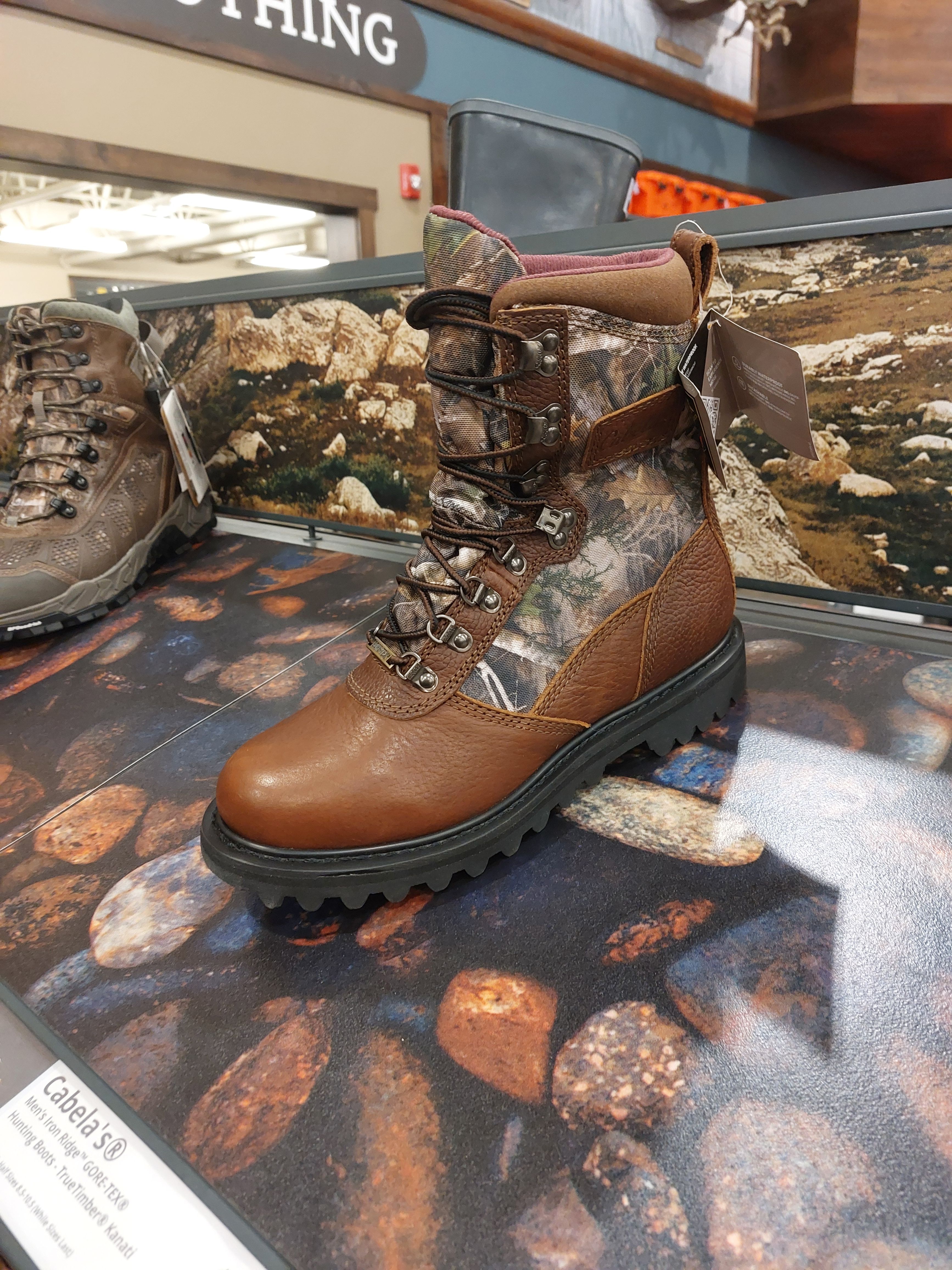 03jul24 - camo boot in cabelas hunting store